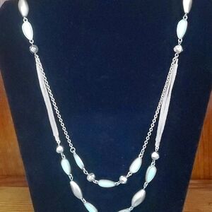 Acrylic beads with gold tone and leather chain